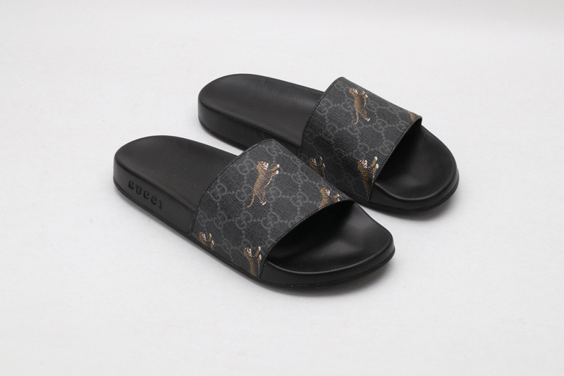 G*u*i slides all black with "tiger"